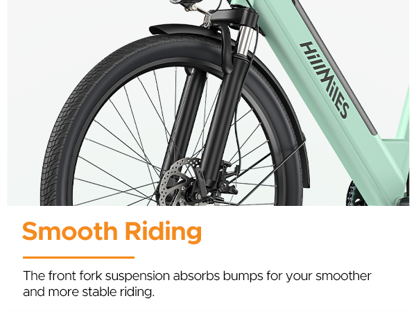 E-bike verde menta, ruota anteriore, forcella e parafango. Marchio HillMiles visibile.