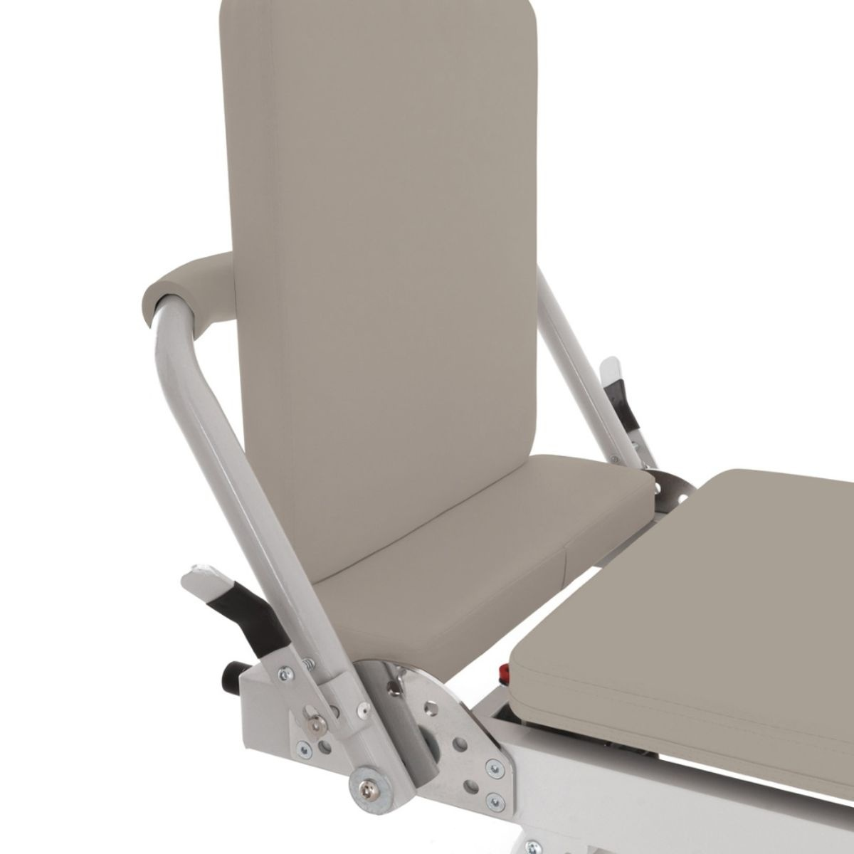 A beige chair with a metal frame, armrests, and adjustable parts.