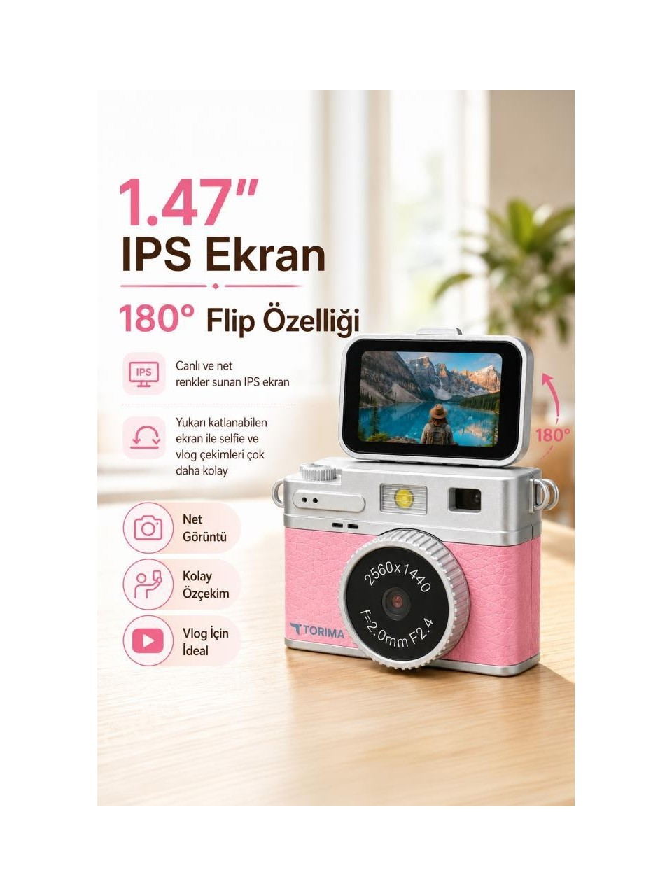 Torima logolu, pembe renkli, çevrilebilir ekranlı dijital fotoğraf makinesi.