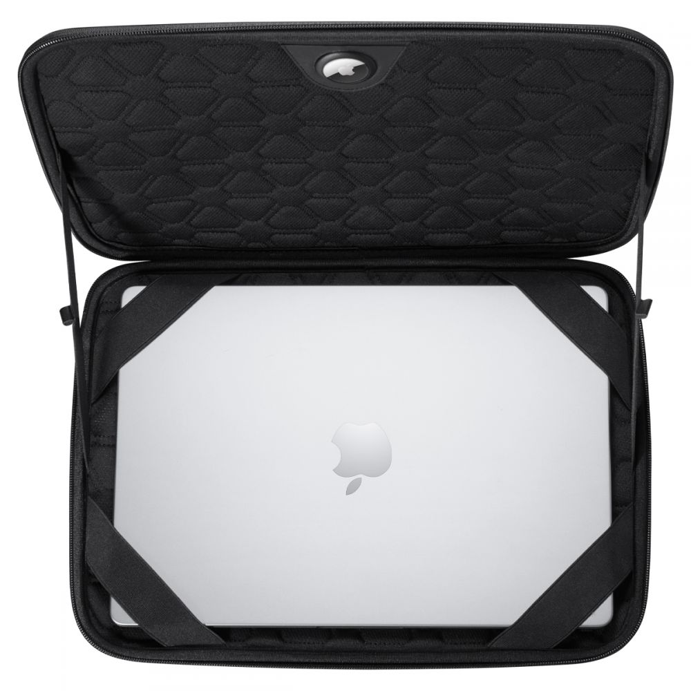 Una custodia per laptop nera aperta con un laptop argentato fissato da cinghie nere.