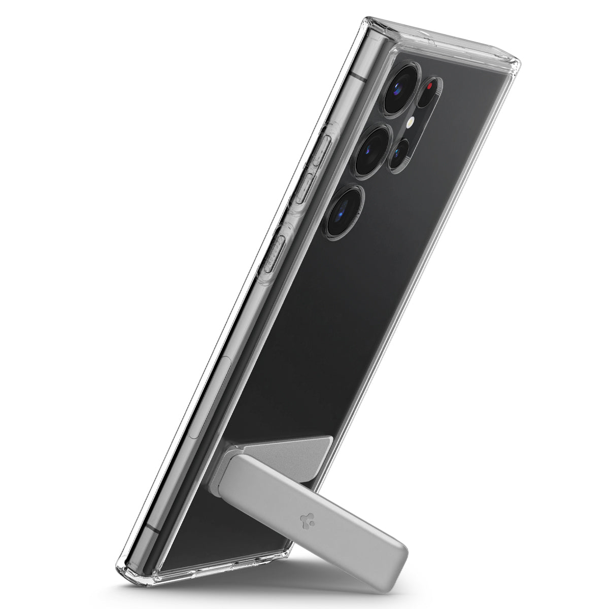 Una custodia trasparente per telefono con cavalletto argentato su sfondo bianco.