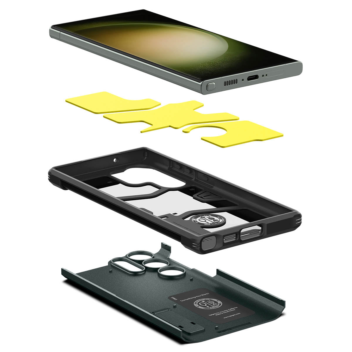 Vista esplosa di uno smartphone grigio, imbottitura in schiuma gialla, custodia nera per telefono e una piastra posteriore grigio scuro testurizzata.