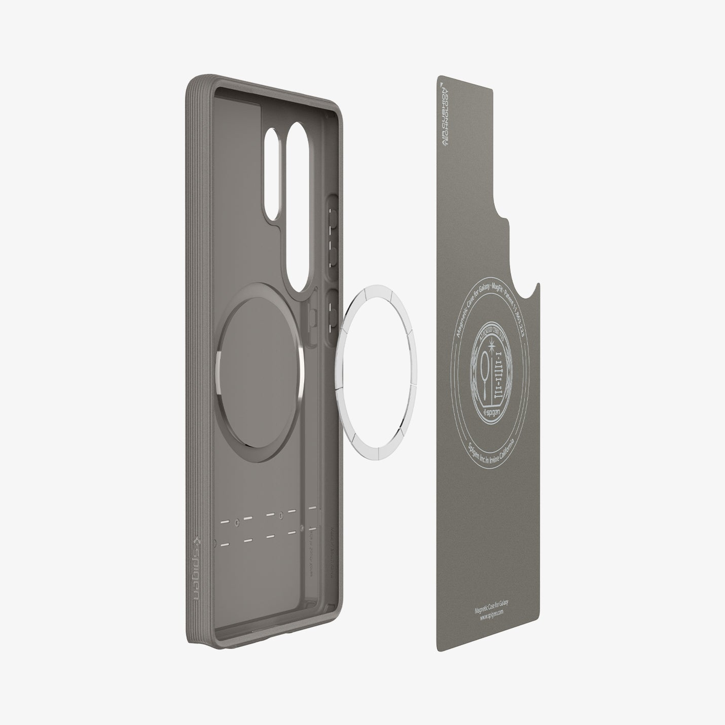 Custodia per telefono grigia con anello magnetico e piastra metallica su sfondo bianco.