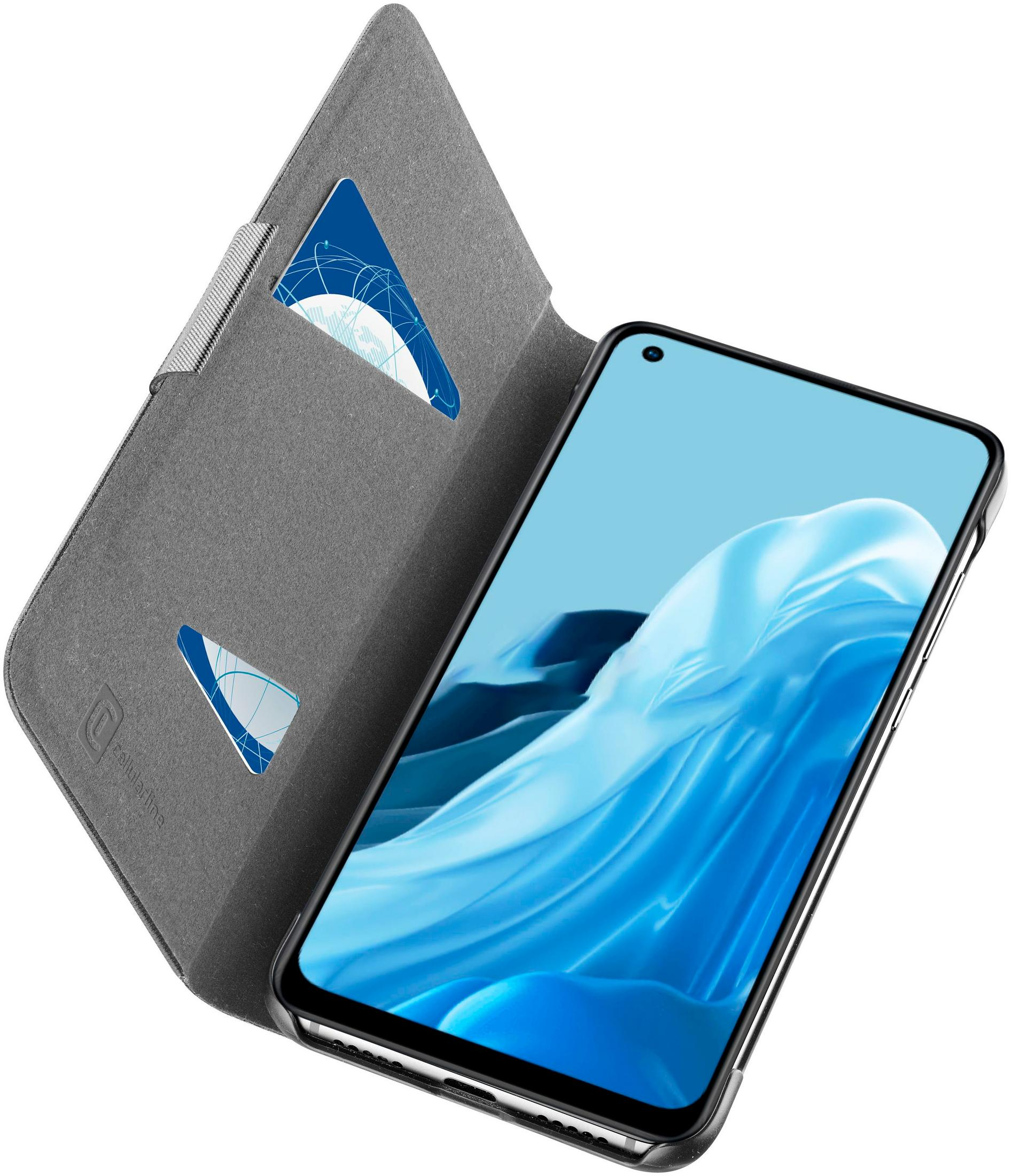 Una custodia a libro grigia con uno smartphone all'interno. Ha due slot per schede.