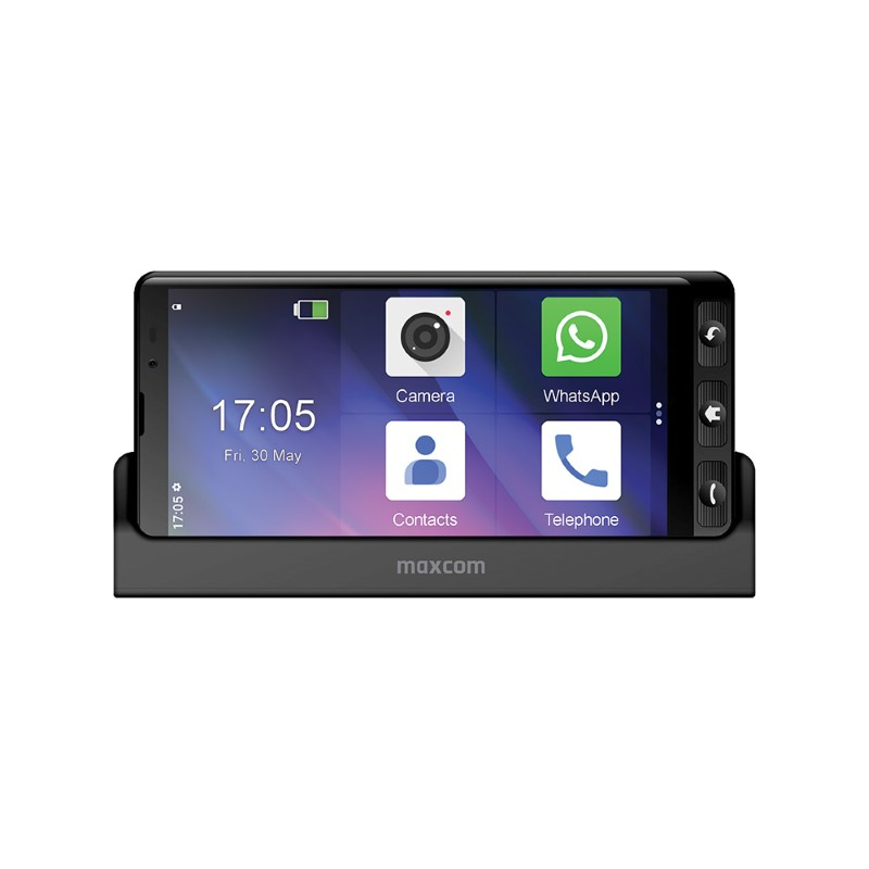 Un telefono Maxcom che mostra app come Fotocamera, WhatsApp, Contatti e Telefono.
