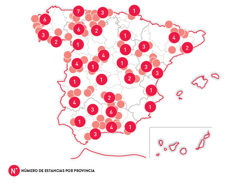 Mapa de España con círculos rojos que indican el número de estancias.