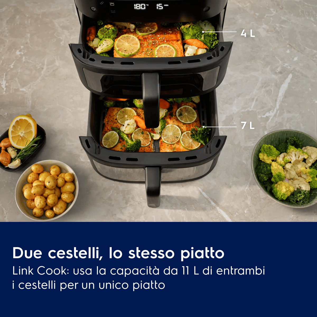 Doppia friggitrice ad aria con salmone, verdure, limone e patate.