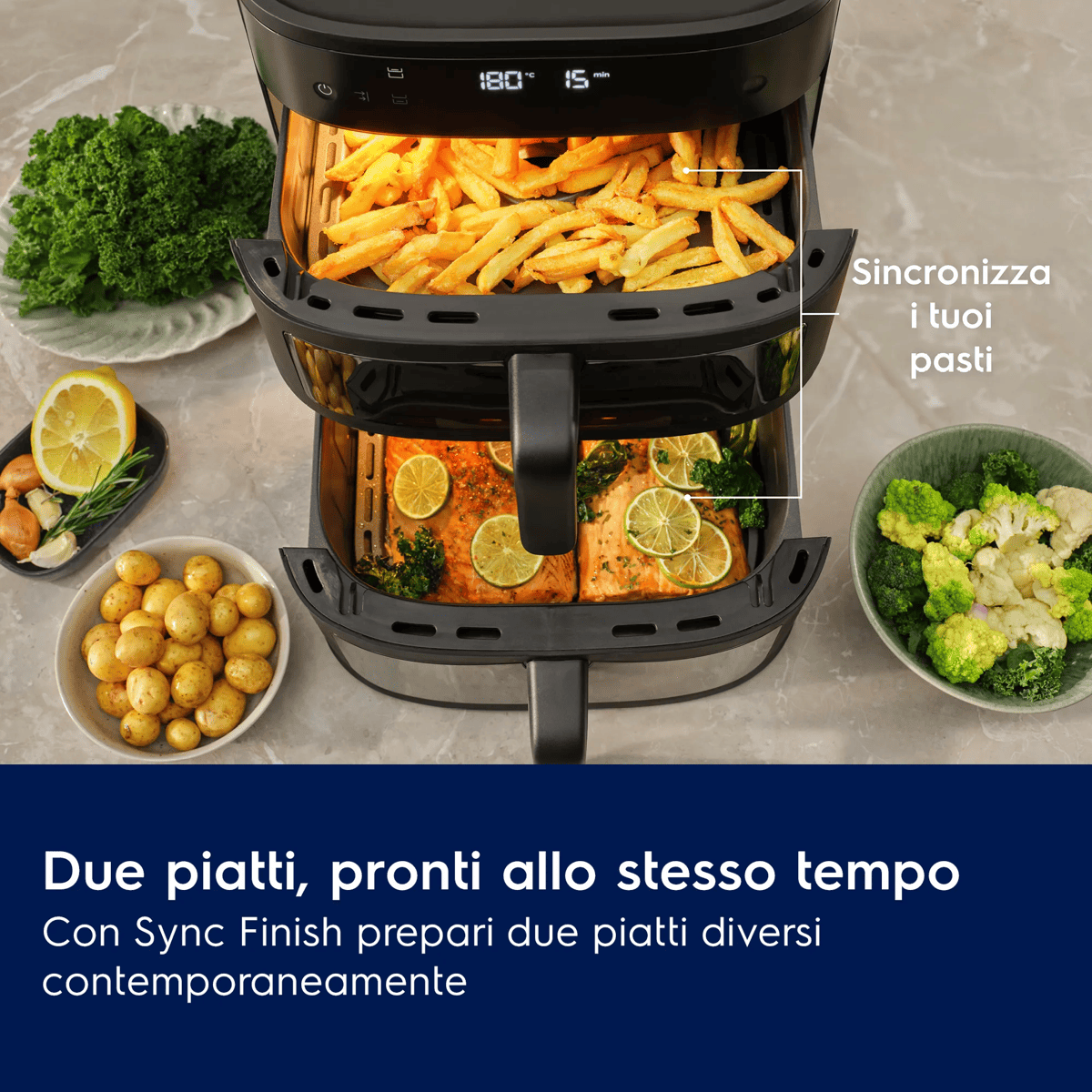 Doppia friggitrice ad aria con patatine, salmone e verdure. Funzione Sync Finish.