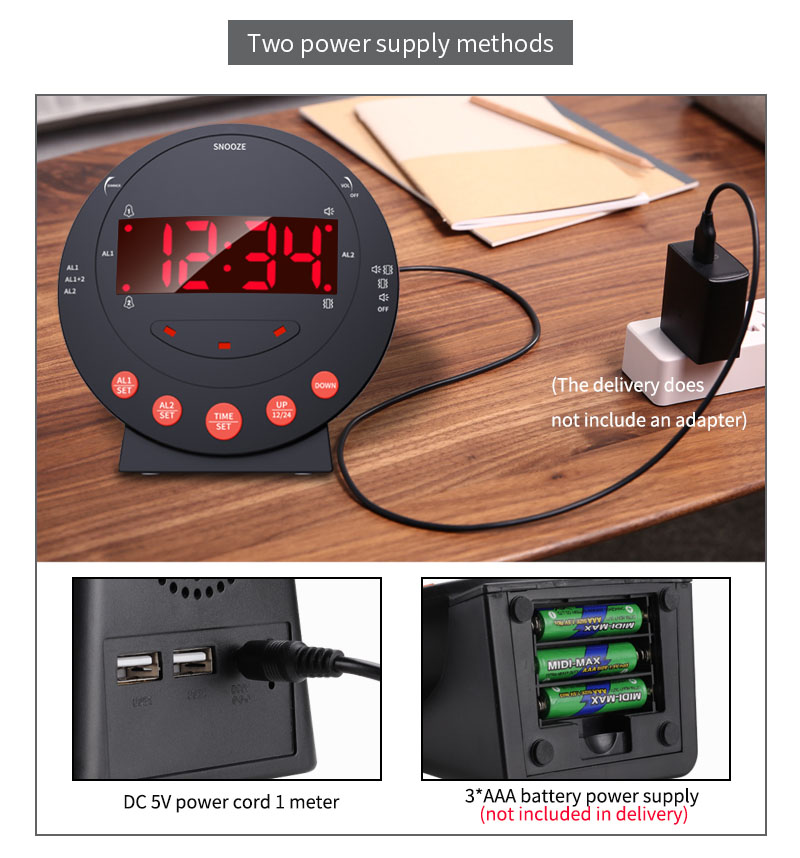 Een zwarte digitale wekker met rood display dat 12:34 toont, gevoed via USB of AAA-batterijen.