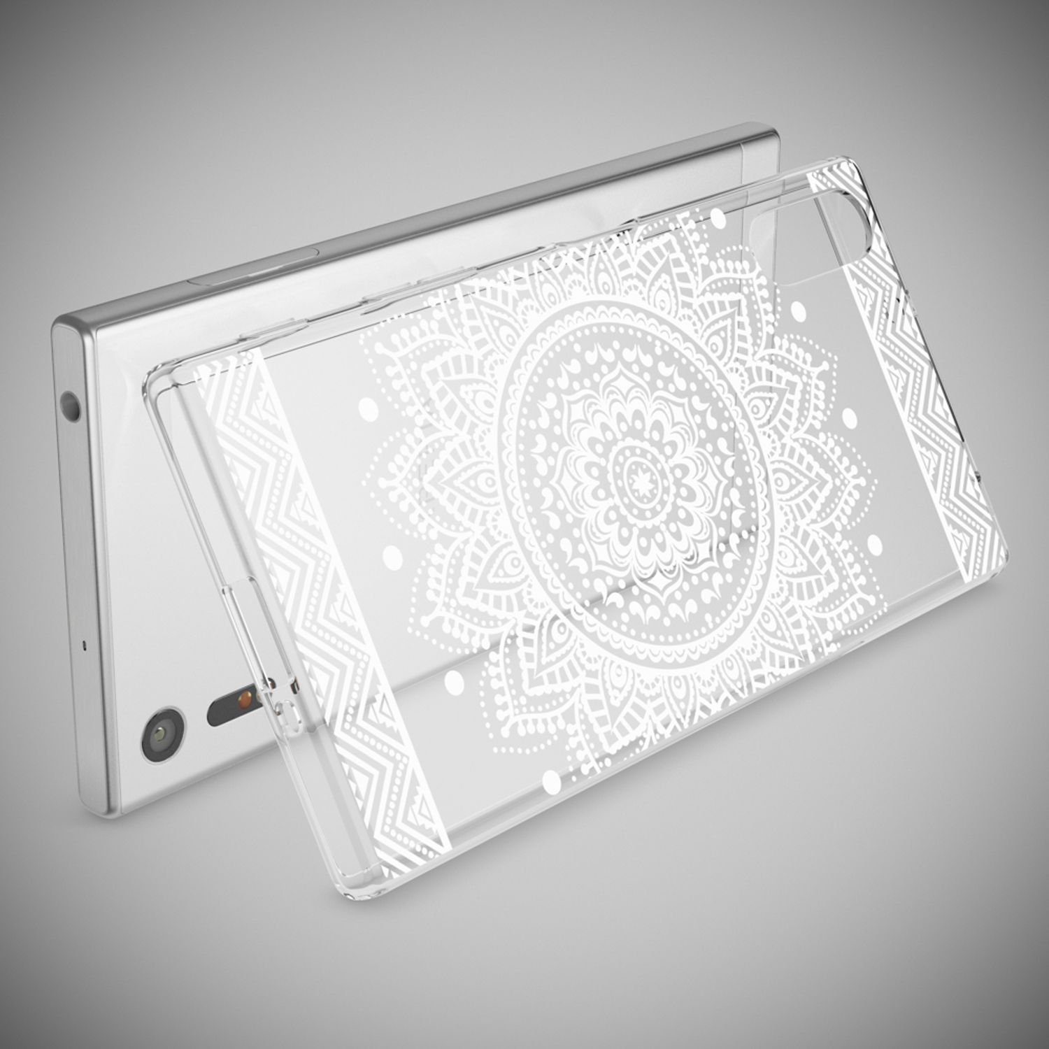 Eine durchsichtige Handyhülle mit weißem Mandala-Design liegt über einem silbernen Smartphone.
