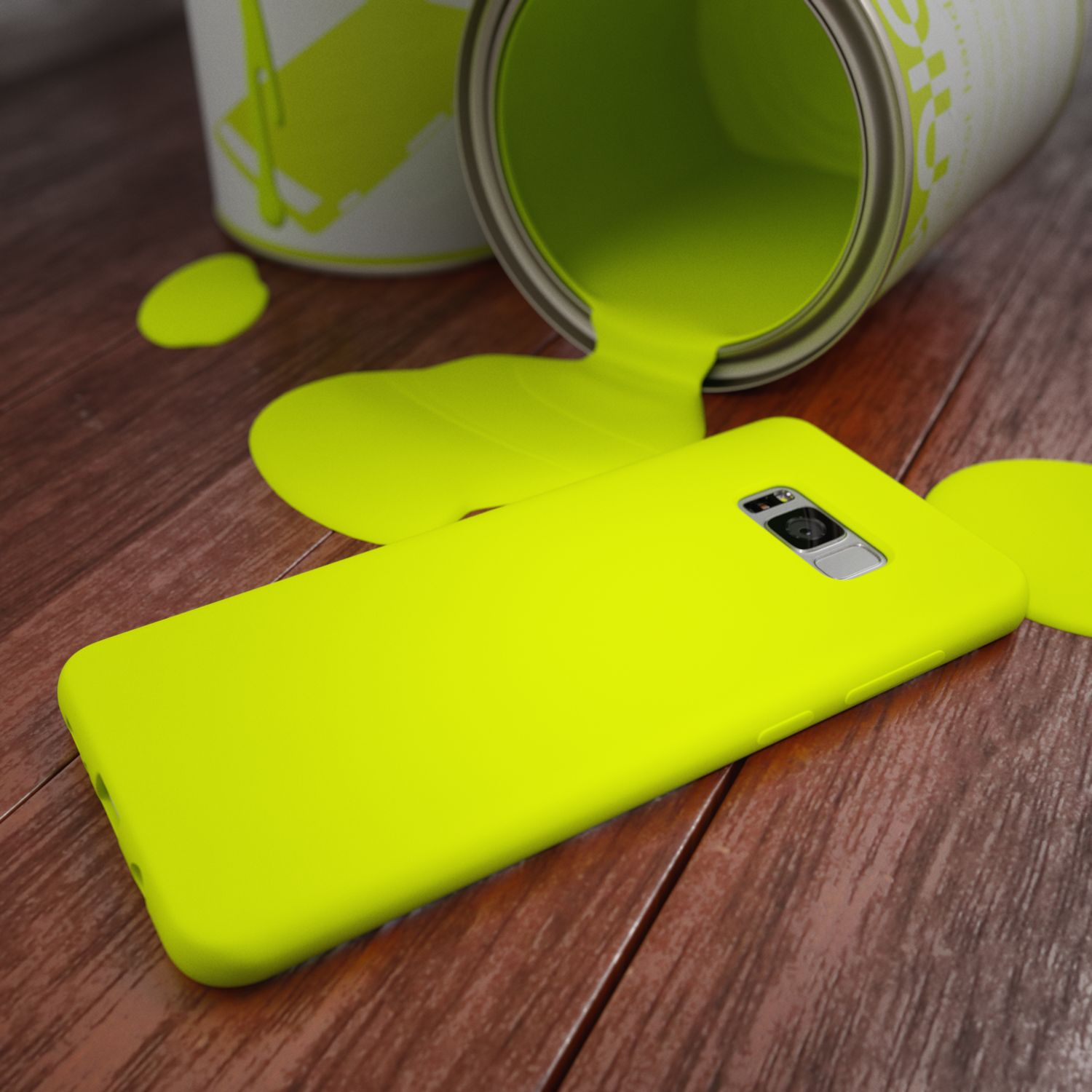 Eine Dose leuchtend gelber Farbe ist umgekippt und verteilt sich auf einem Holzfußboden neben einem passenden Smartphone.