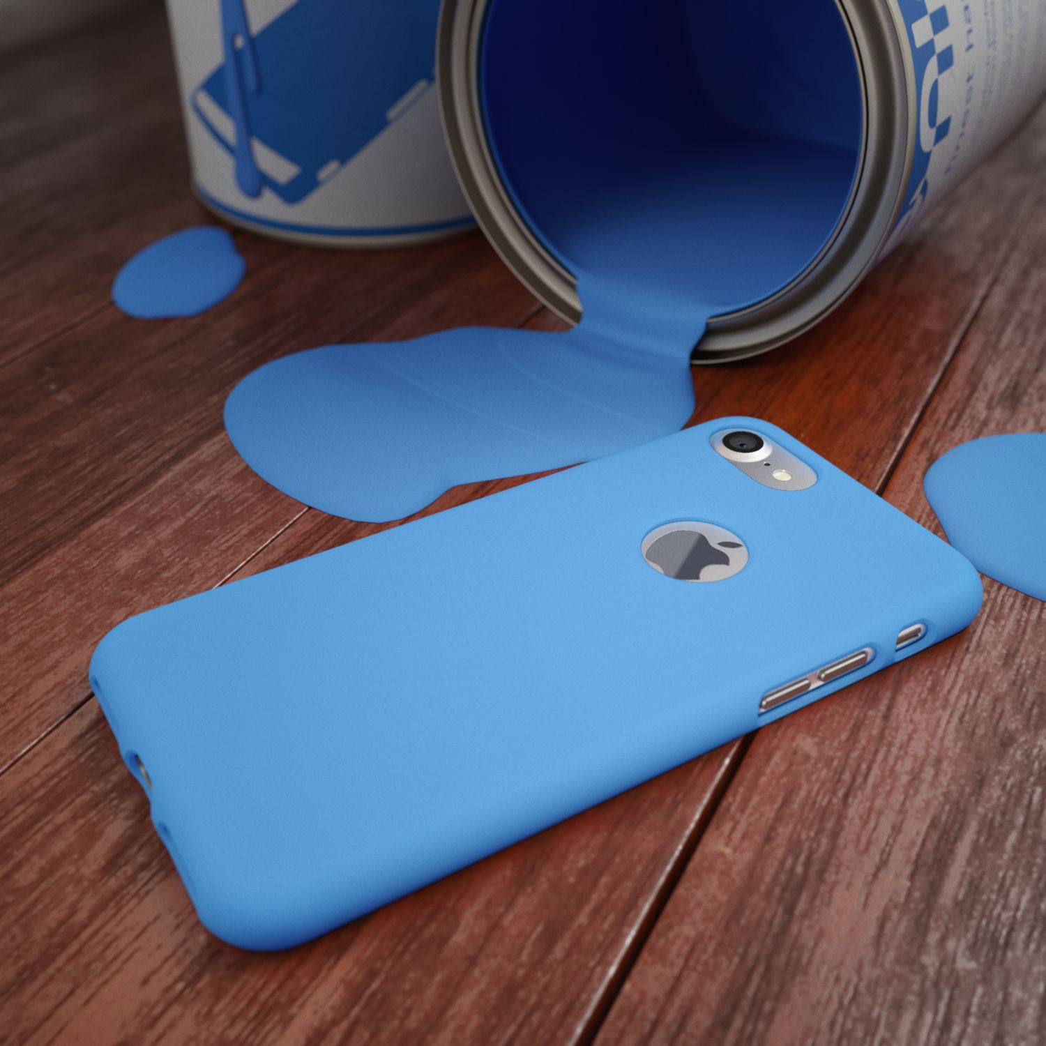 Ein blauer iPhone-Schutz und ein umgekippter Farbeimer mit verschütteter blauer Farbe.