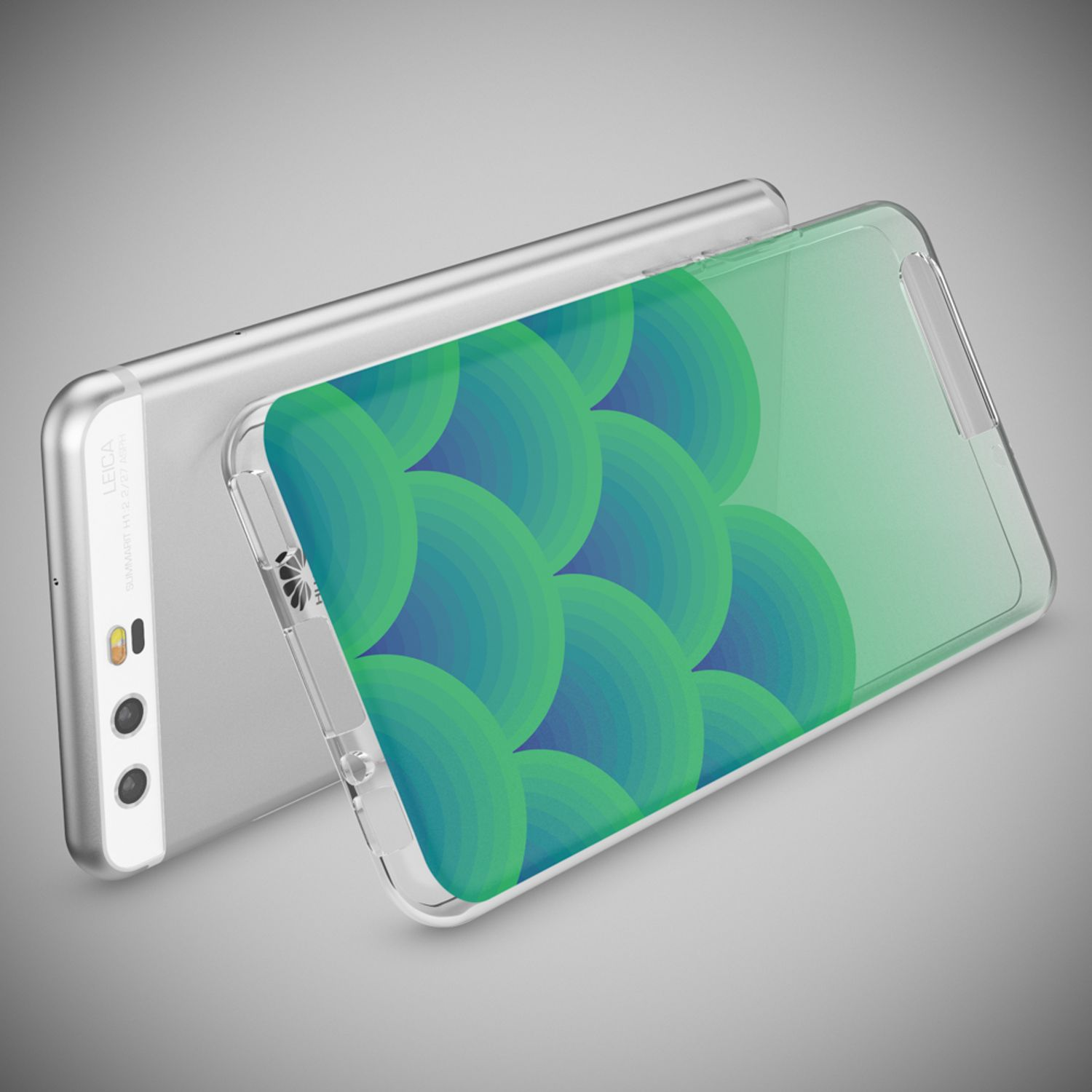 Uno smartphone argentato giace su uno sfondo grigio. Parte dello schermo è visibile.
