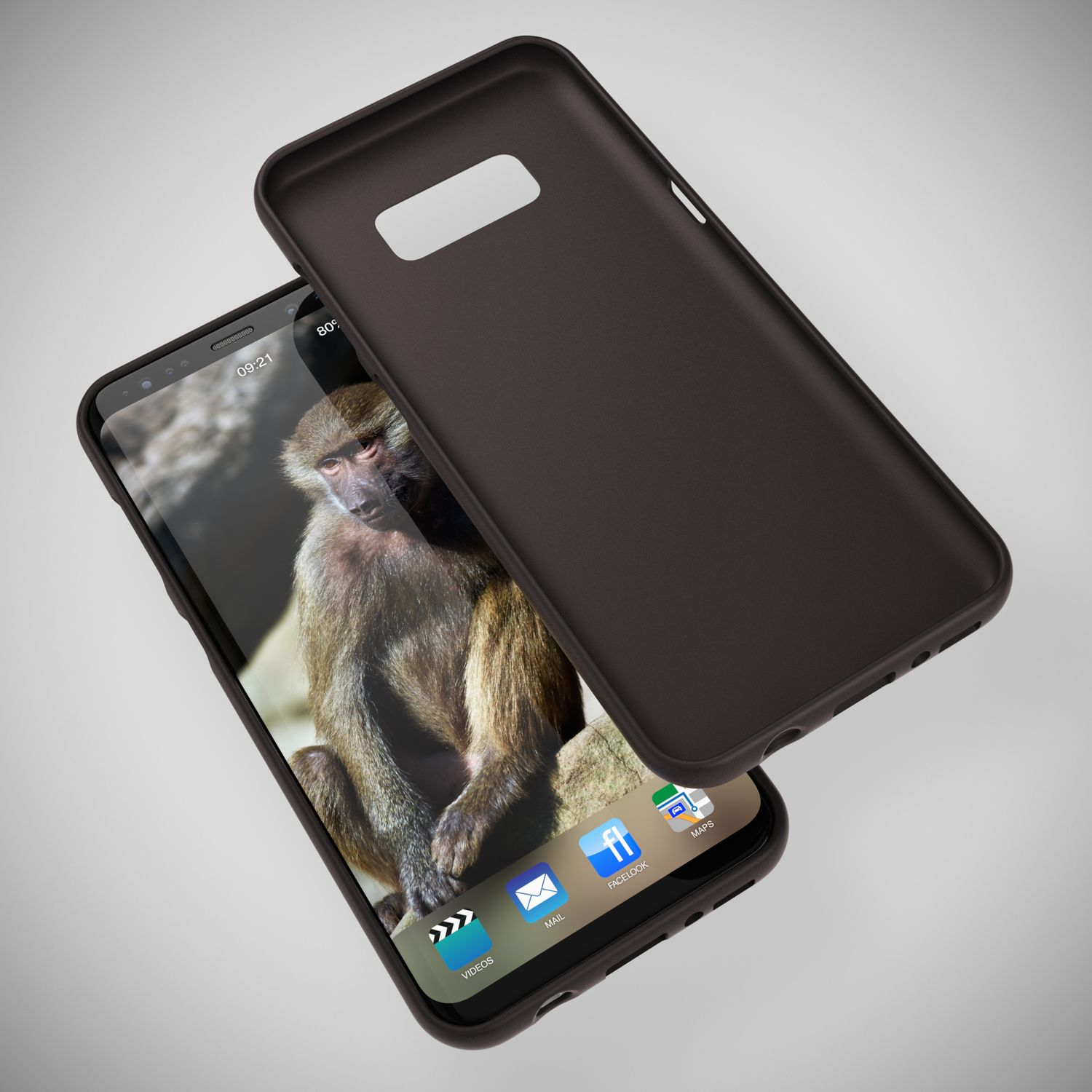 Ein dunkler Handycase liegt neben einem Smartphone mit Affenbildschirm.