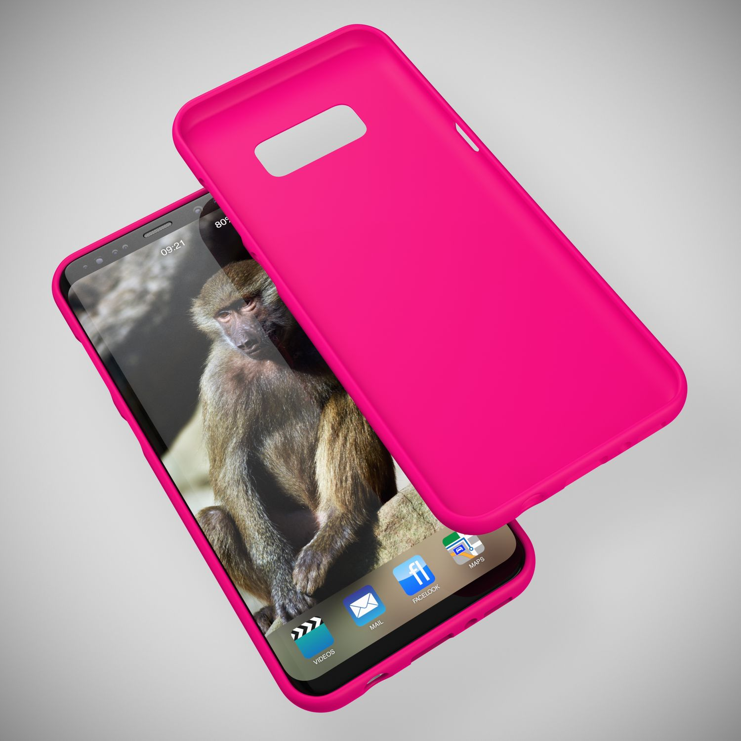 Eine leuchtend pinke Handyhülle liegt auf einem Smartphone mit einem Pavian-Hintergrundbild.
