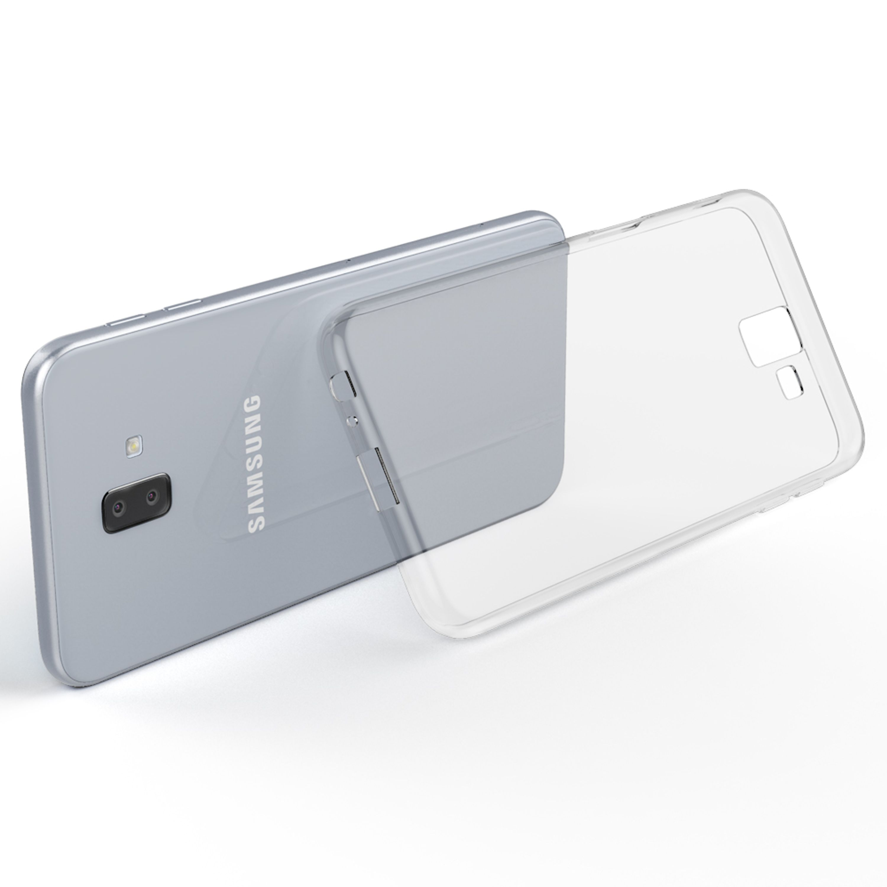 Una cover trasparente per telefono giace accanto a un telefono Samsung argentato.