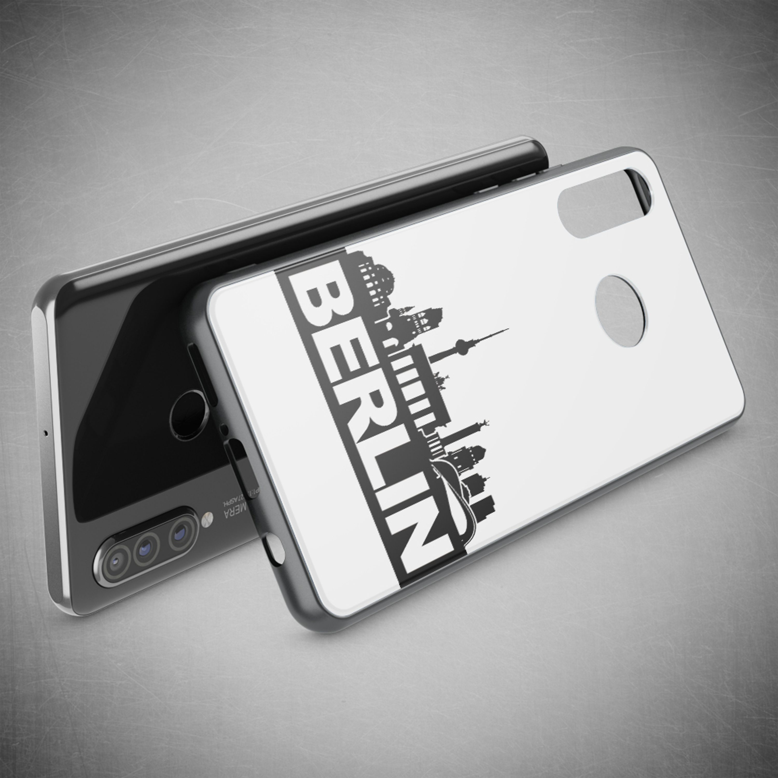 Ein schwarzes Smartphone mit einer Hülle mit der Skyline von Berlin.