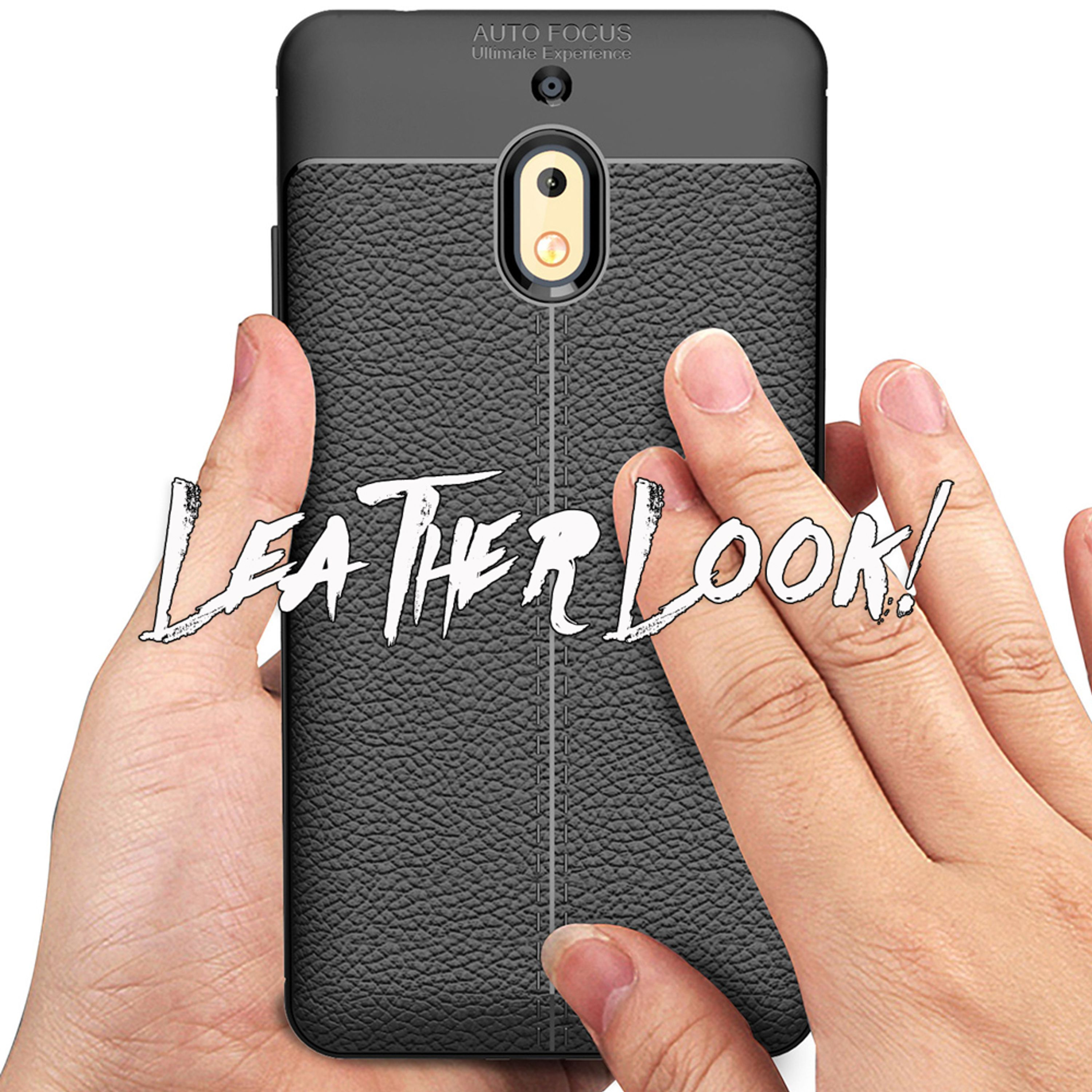 Hände halten ein schwarzes Handy mit Lederstruktur. Text: LEATHER LOOK!