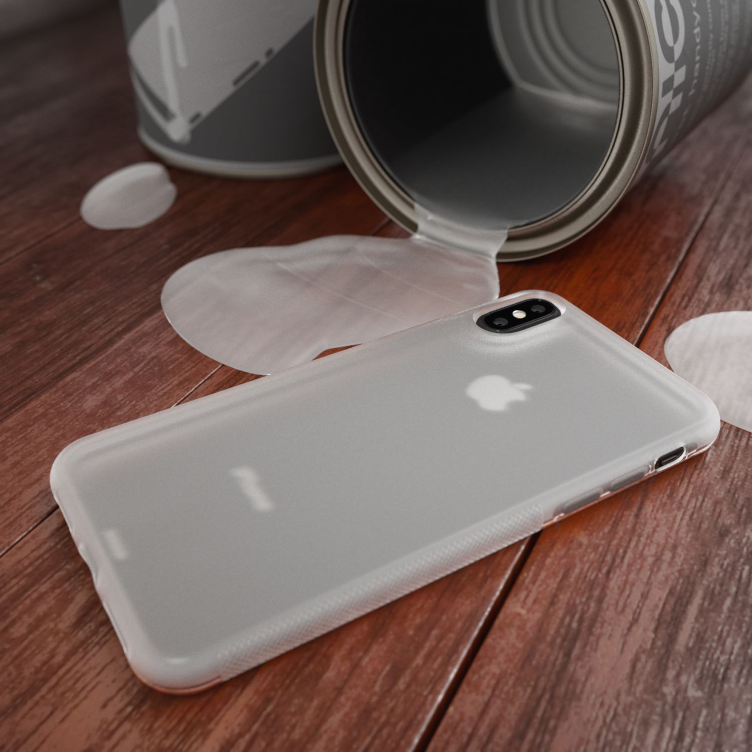 Ein weißes Handy liegt auf einem Holztisch, daneben eine umgekippte Dose mit weißer Farbe.