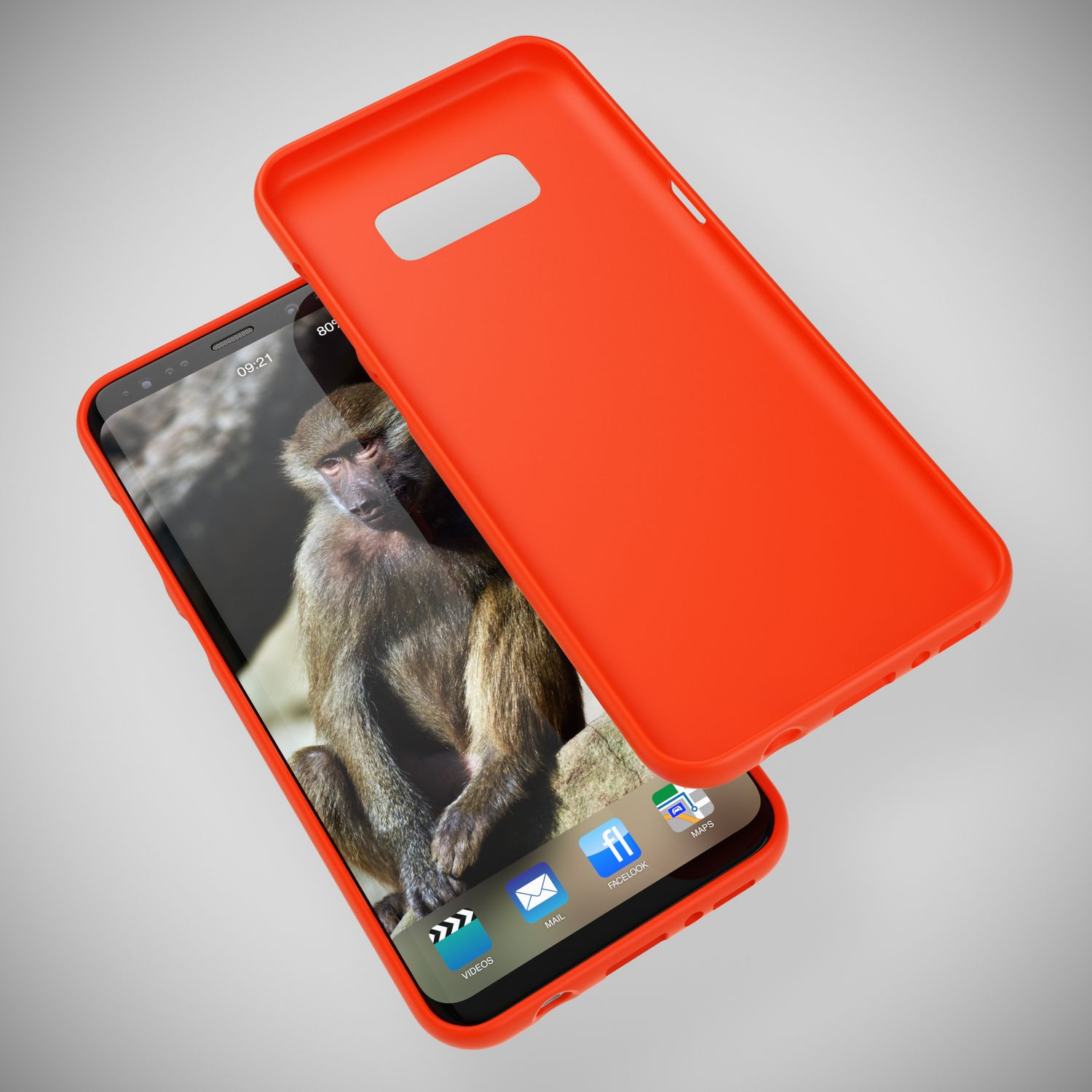 Ein orangefarbener Handykoffer liegt neben einem Smartphone mit einem Affen-Hintergrundbild.