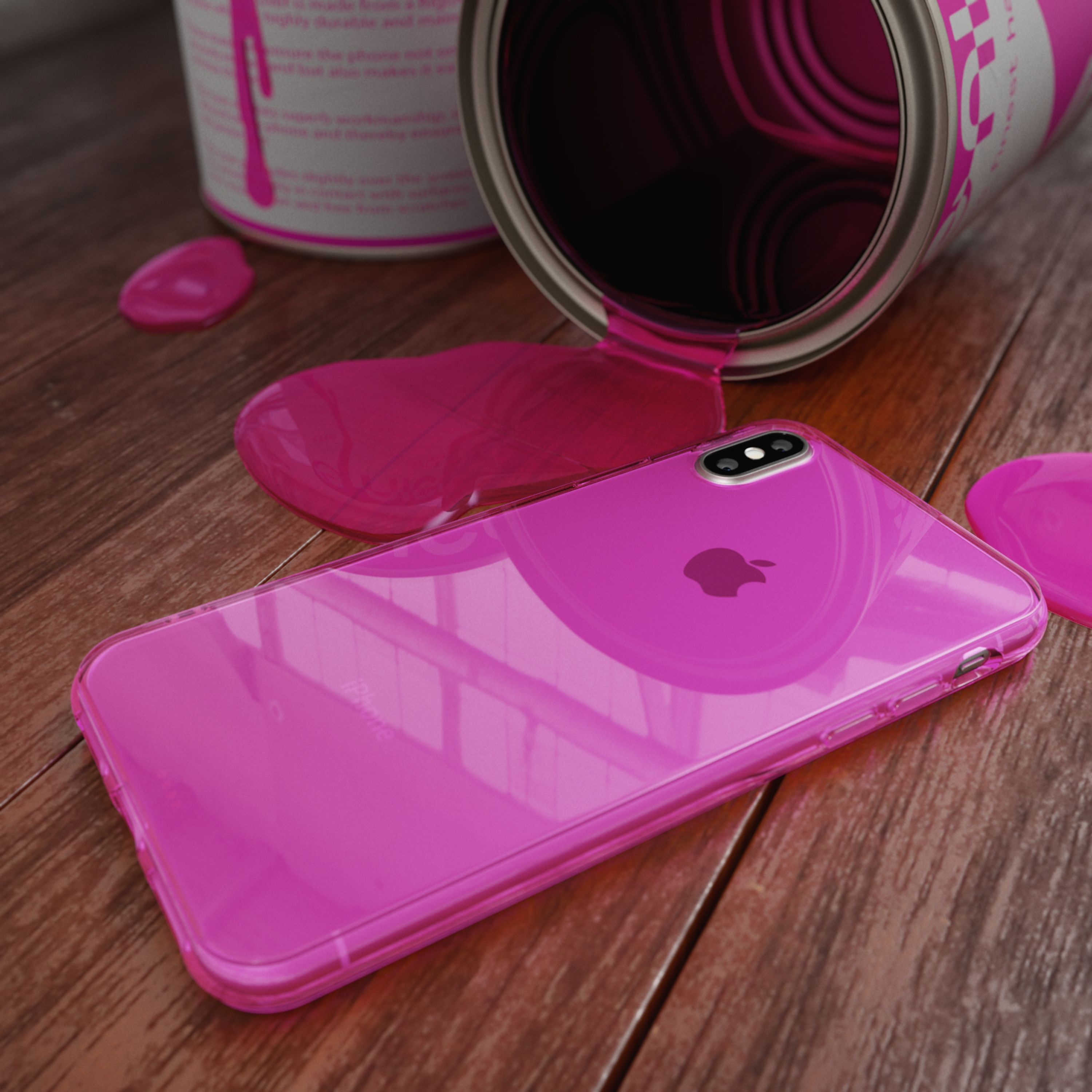 Ein iPhone liegt auf einem Holztisch, daneben eine umgekippte Dose mit verschütteter pinker Farbe.