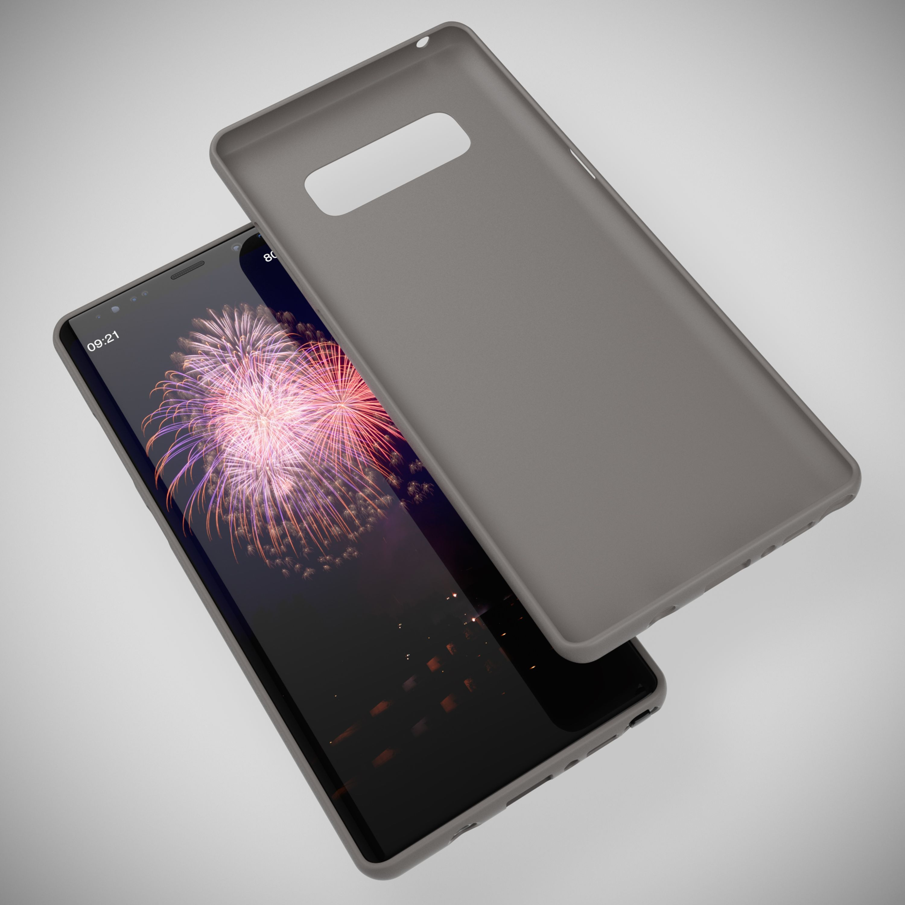 Graue Handyhülle über einem Smartphone mit Feuerwerk-Hintergrund.