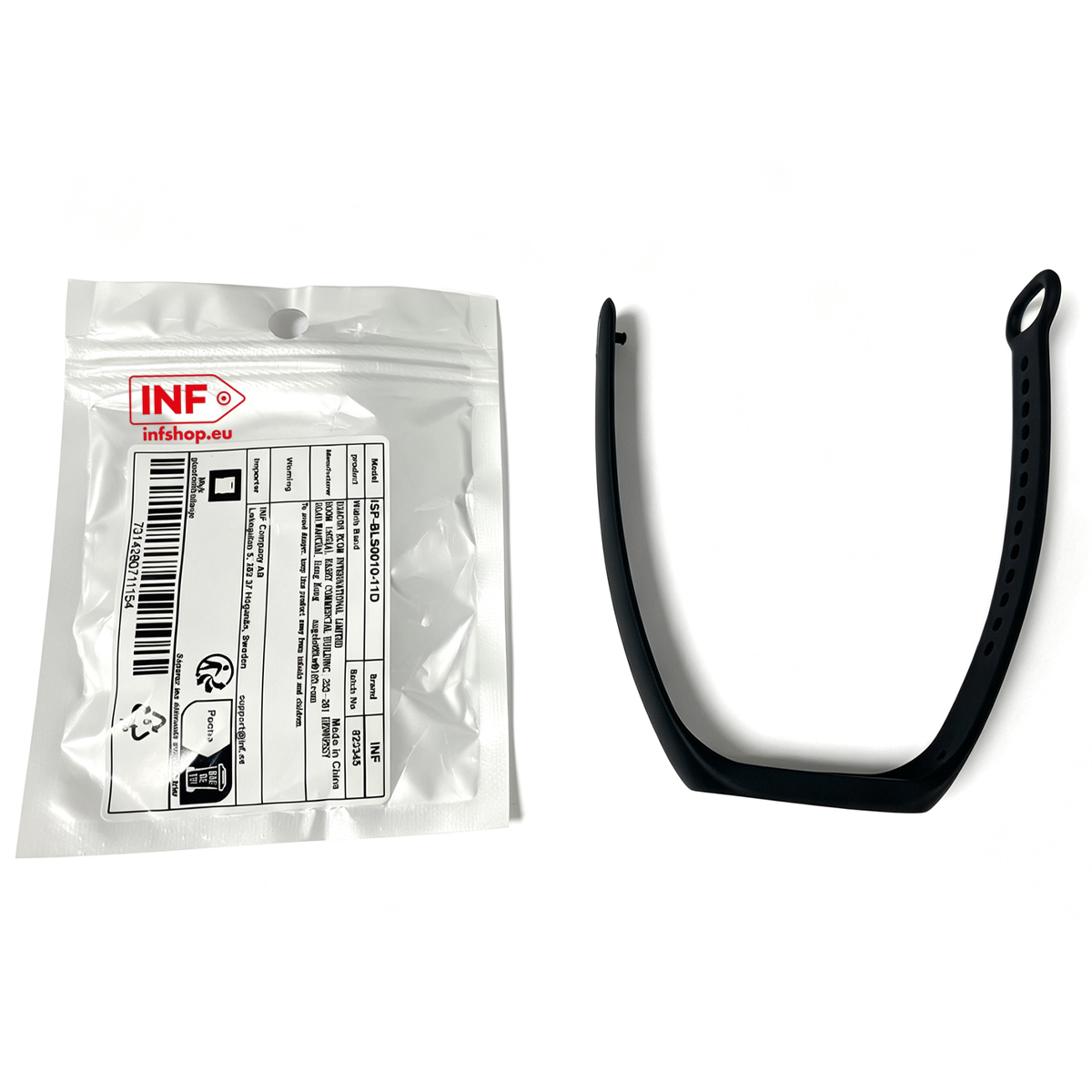 Ein schwarzes Armband und eine geöffnete Verpackung liegen nebeneinander.