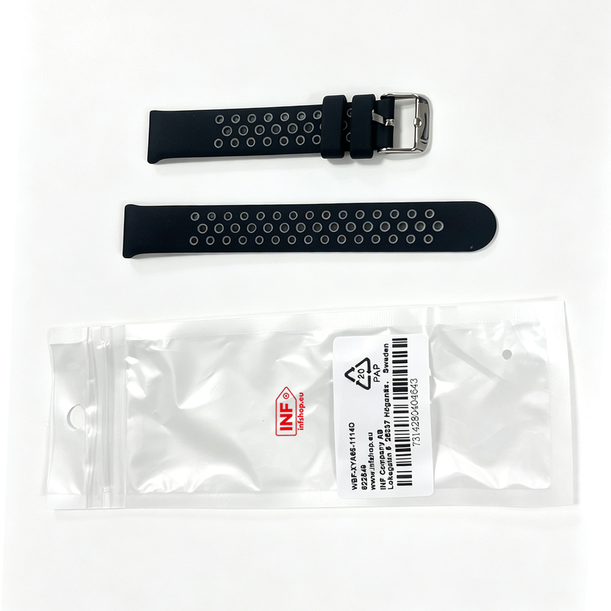 Zwei schwarze Uhrenarmbänder mit kreisförmigen Perforationen und ein verpackter Artikel.