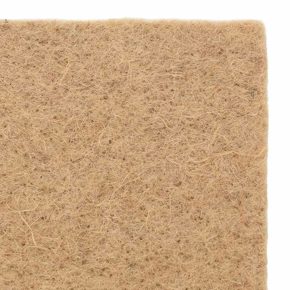 Un primo piano di materiale in fibra di cocco marrone con fili visibili.