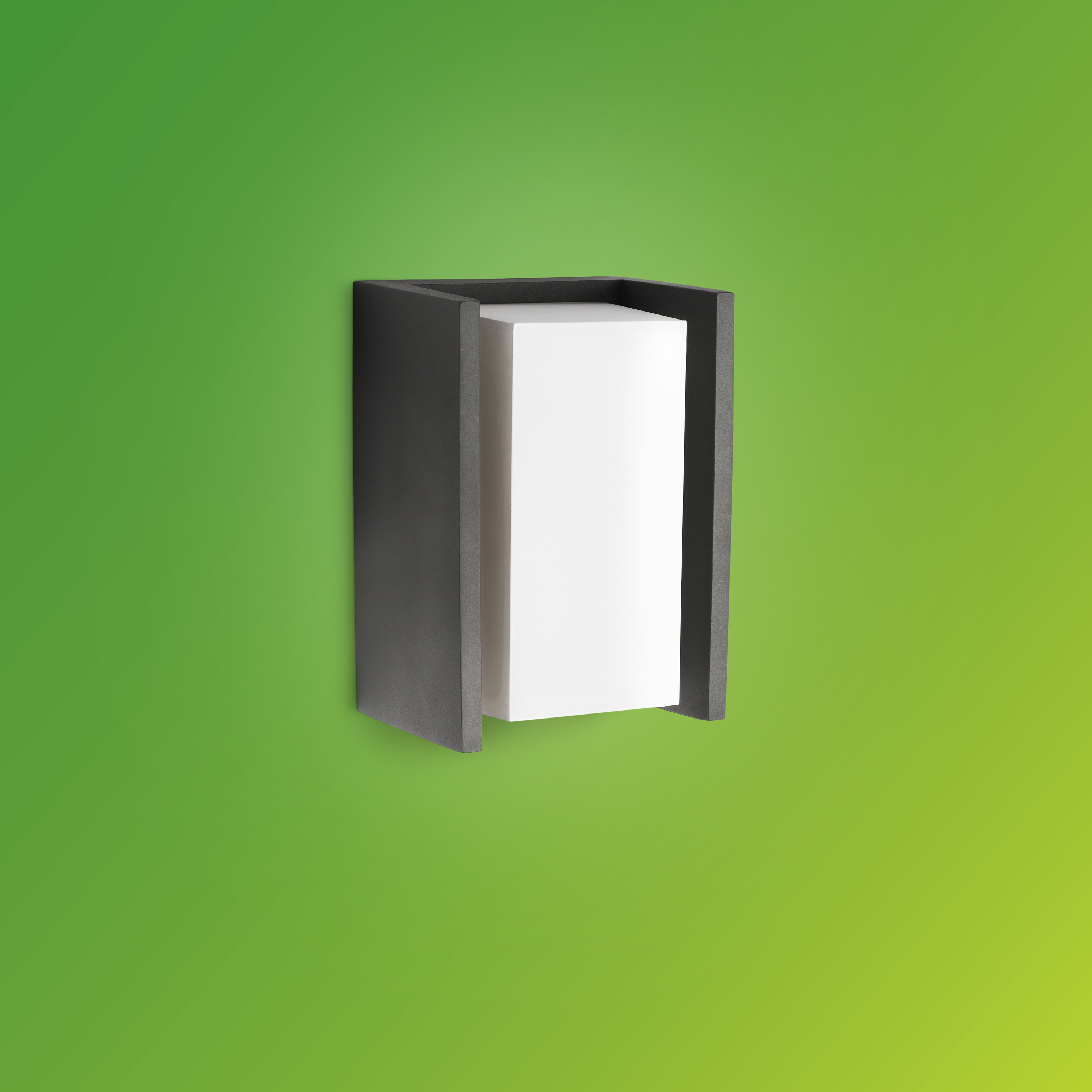 Aplique de pared rectangular oscuro con inserción blanca sobre fondo verde.