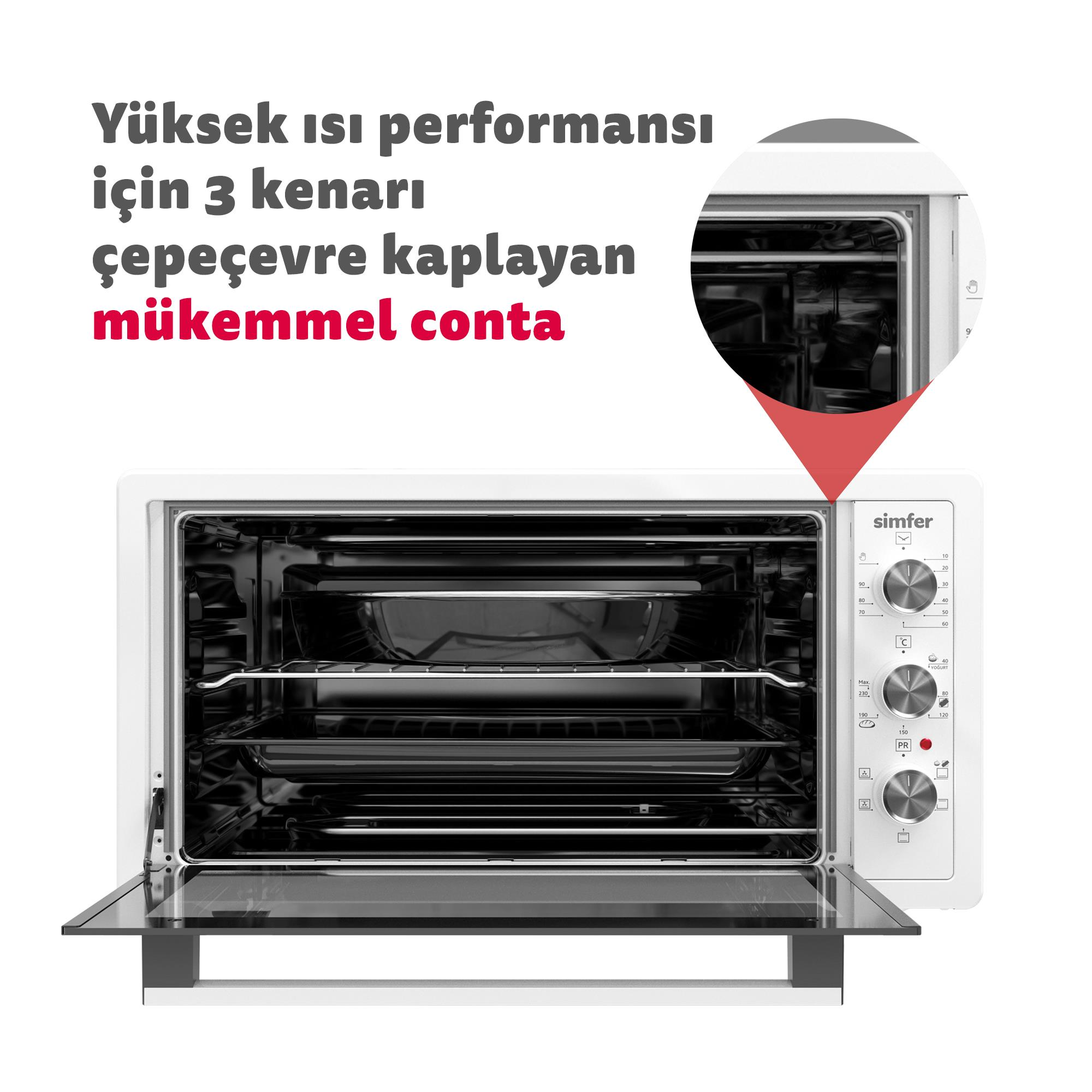 Açık cam kapılı, kontrol düğmeleri görünen beyaz tezgah üstü fırın.