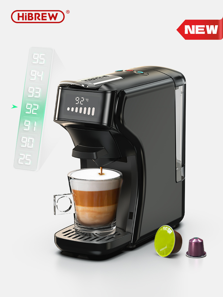 Cafetera negra preparando latte en vaso, con cápsulas y pantalla de temperatura cerca.