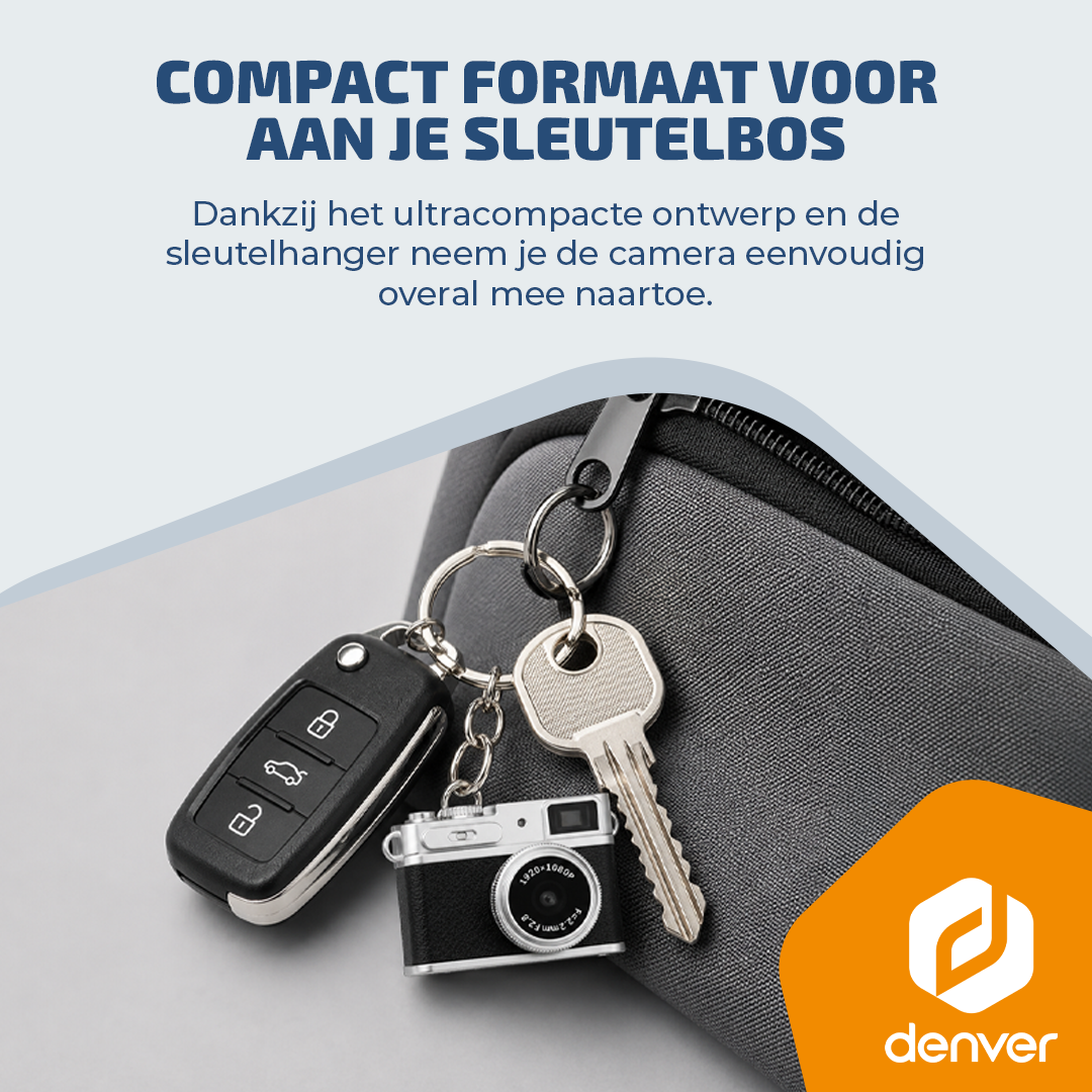 Een autosleutel, een huissleutel en een mini-camera hangen aan een sleutelhanger.