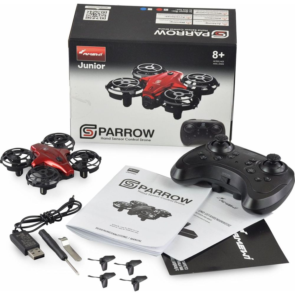 Un mini drone rosso con telecomando, cavi e manuale.