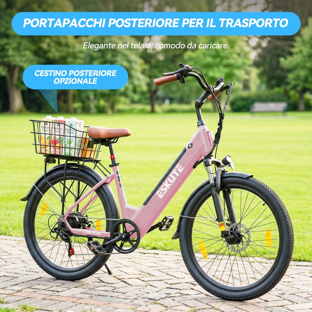 Una e-bike rosa con portapacchi e cestino opzionale su un sentiero pavimentato all'aperto.