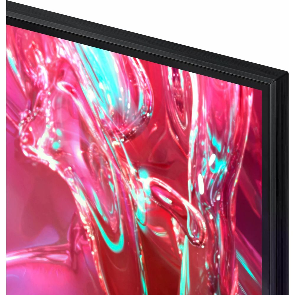 Une TV noire moderne affichant un fond abstrait rouge et turquoise.