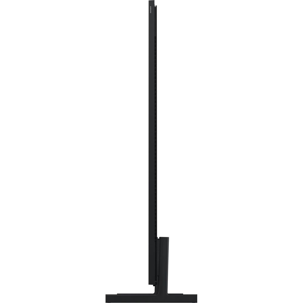 Téléviseur noir avec pied, vu de côté.