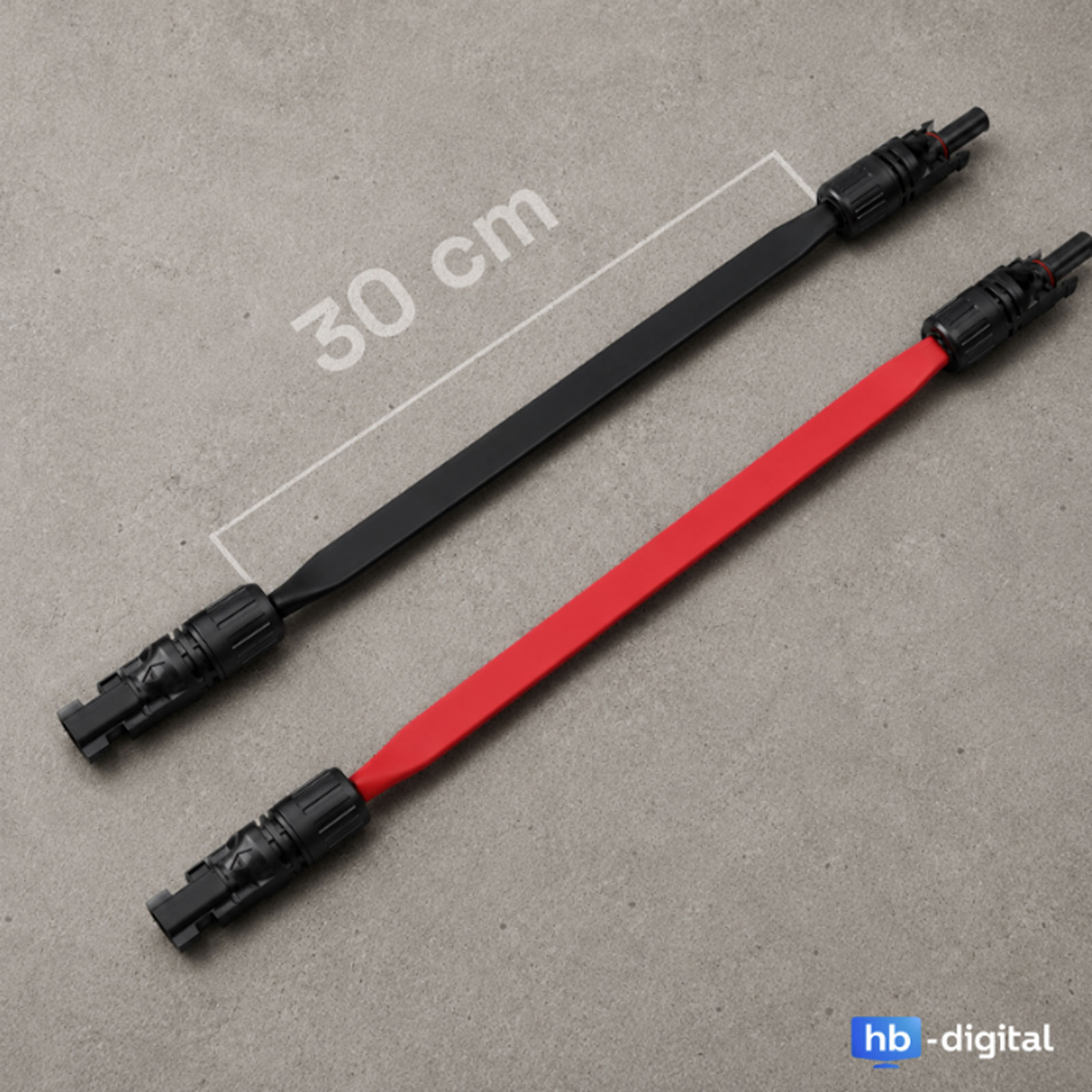 Ein schwarzes und ein rotes Solarkabel mit Steckverbindern liegen auf Beton.