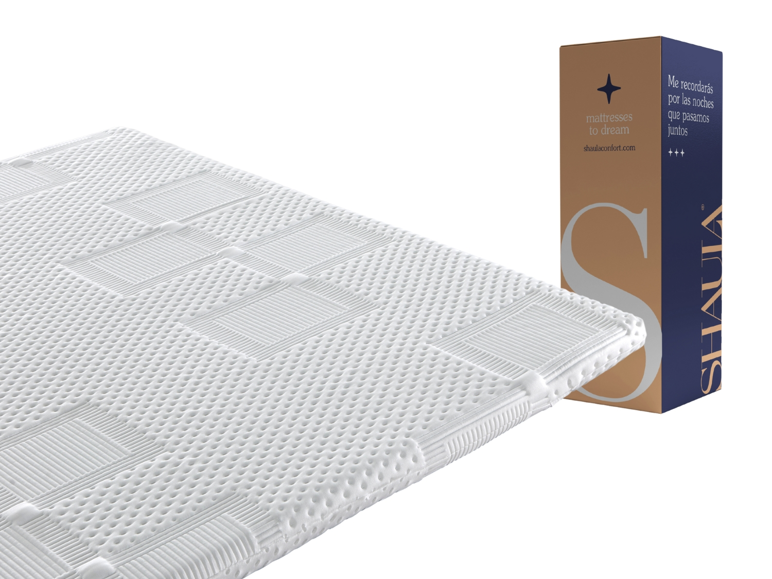 Un colchón blanco texturizado junto a una caja marrón y azul con texto.