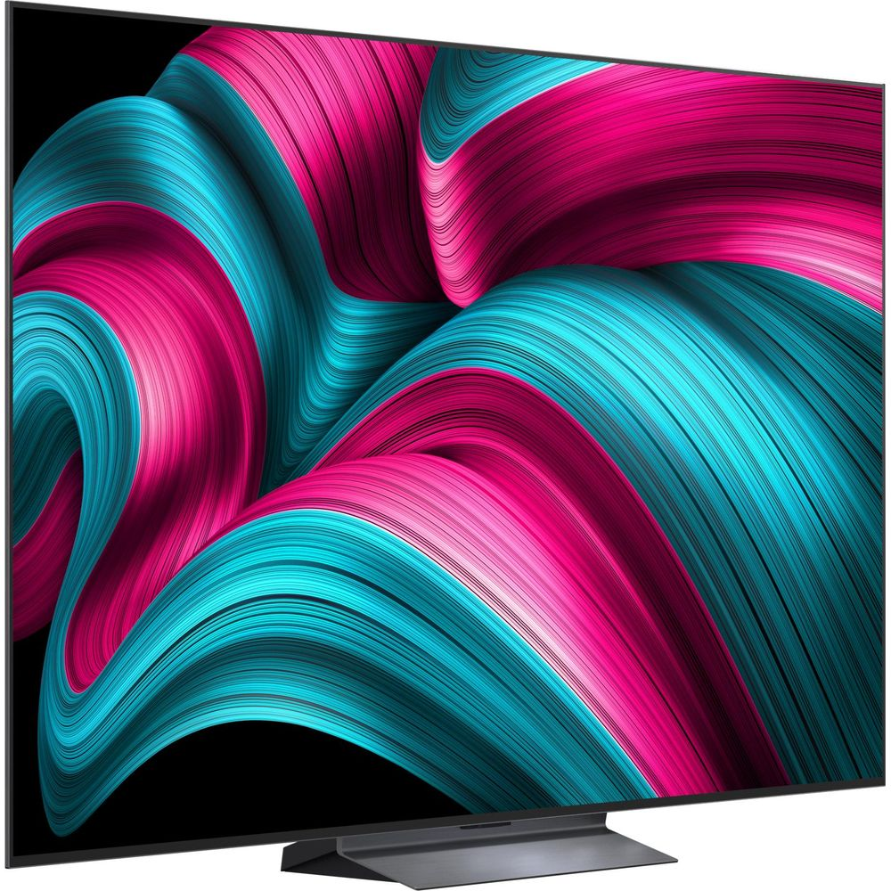 Un téléviseur moderne affichant un motif abstrait et ondulé en bleu et rose sur son écran.