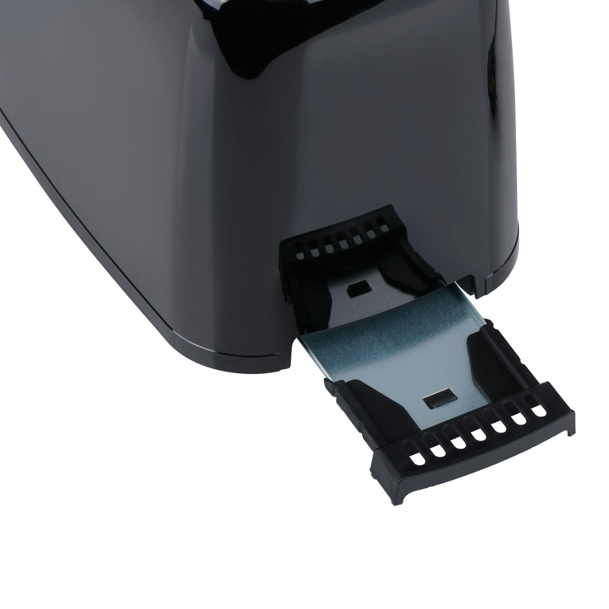 Close-up of a black toaster with its metal crumb tray extended.