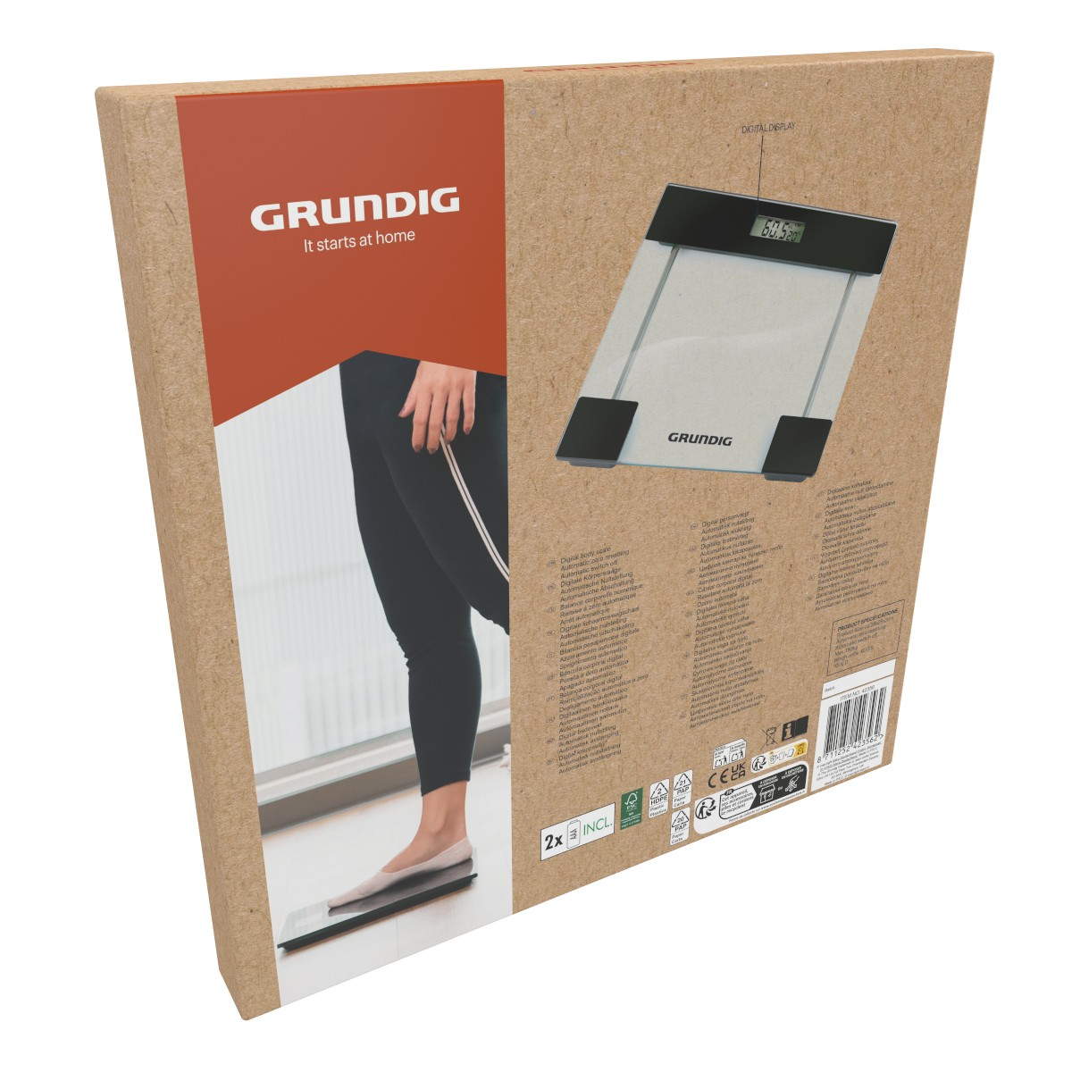 Balance personnelle Grundig sur emballage carton avec une personne debout.