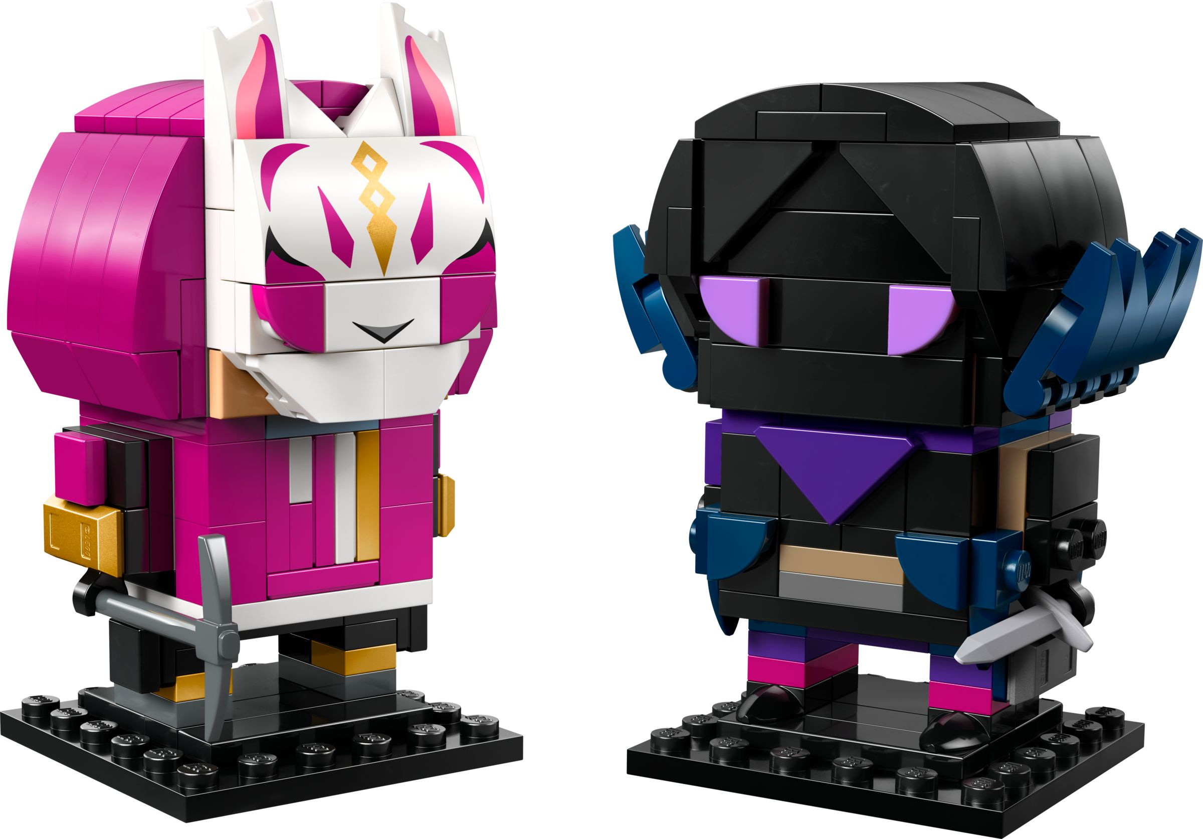 Yan yana duran iki Lego figürü, biri pembe, diğeri siyahtır.