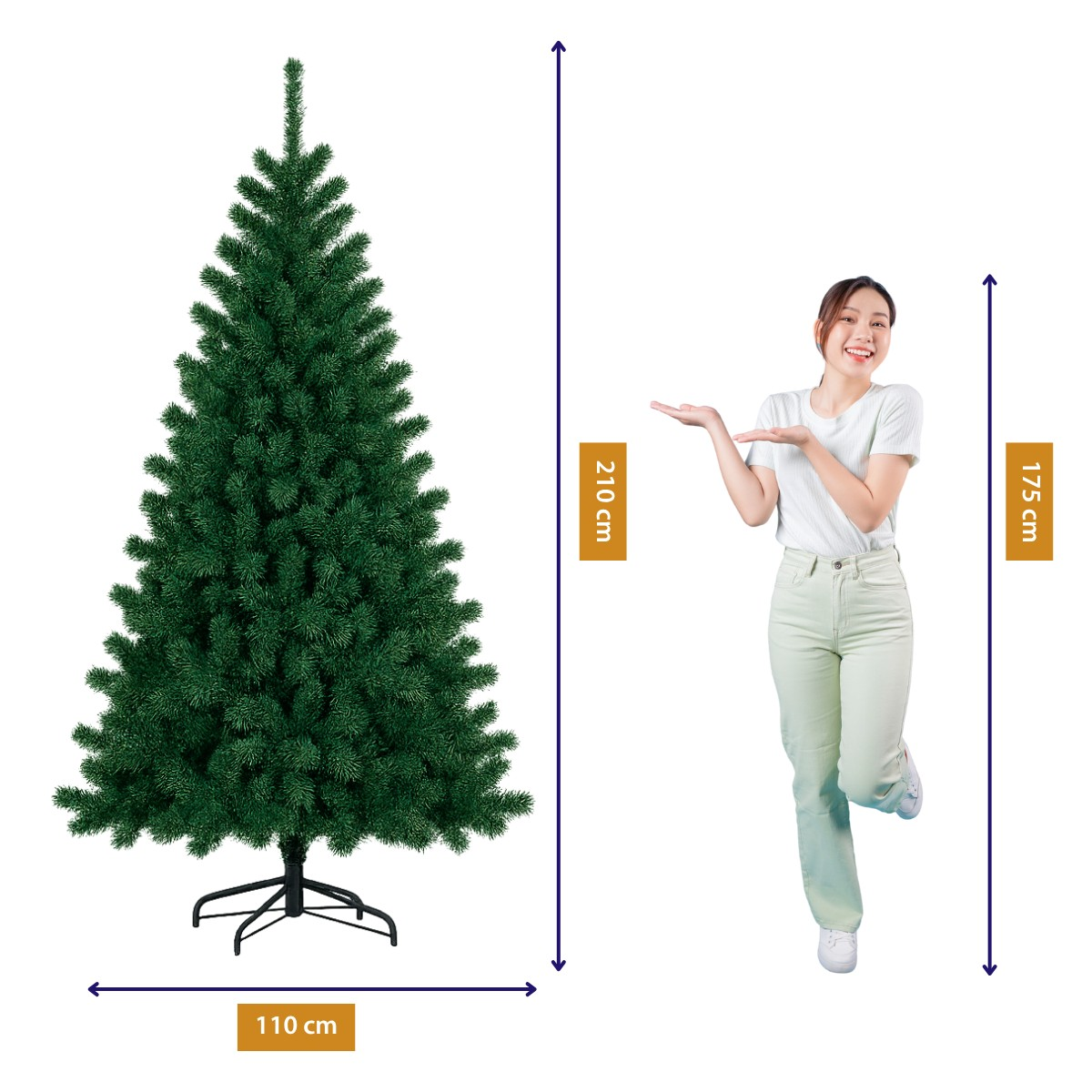 A 210cm tall artificial Christmas tree with a 110cm base width stands next to a 175cm tall woman.