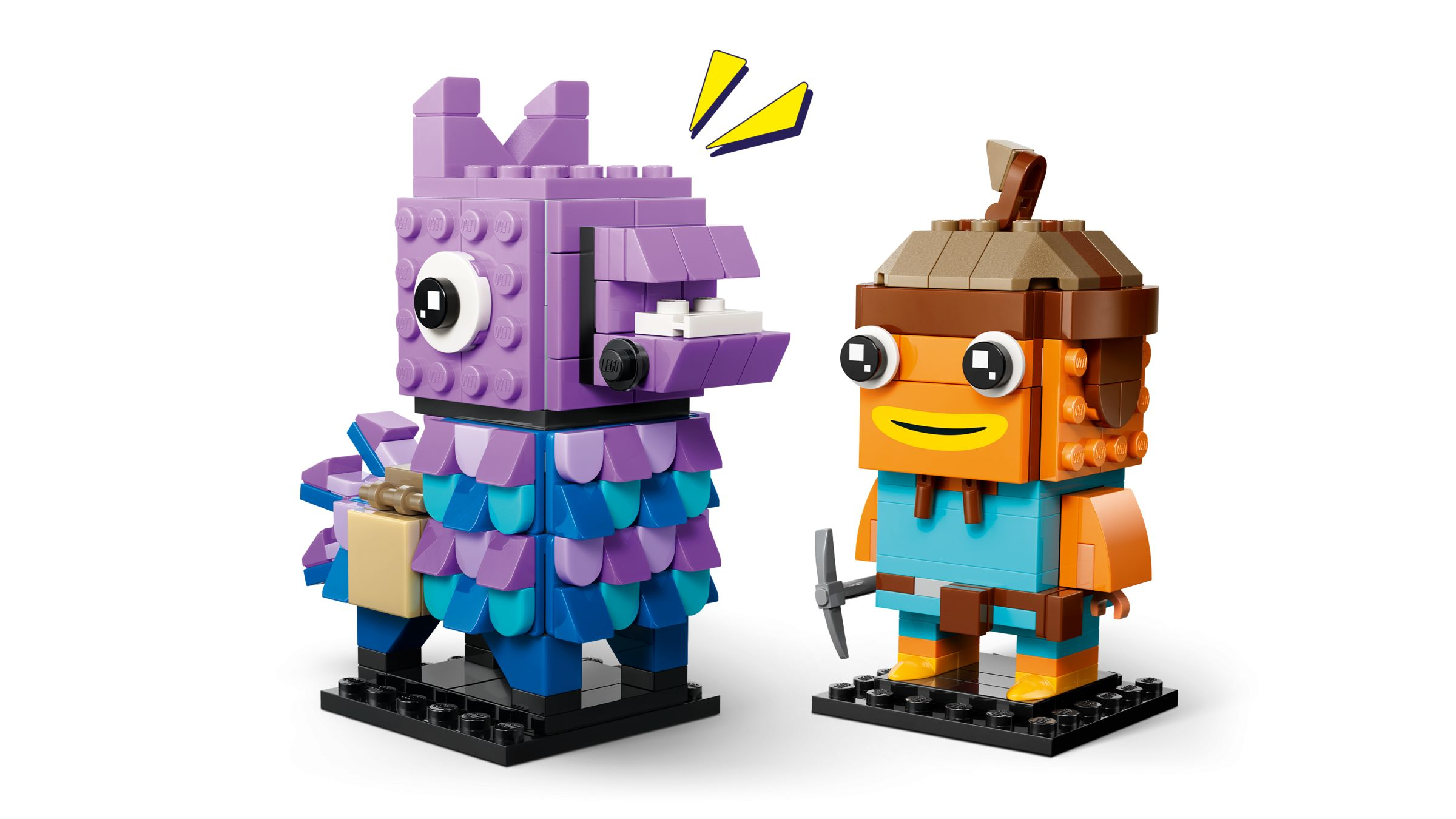 İki Lego figürü: mor bir lama figürü ve turuncu bir balık figürü.