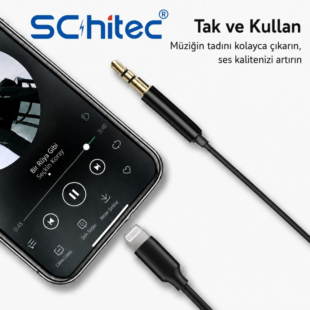 Müzik uygulaması gösteren akıllı telefonun yanında siyah 3,5 mm jak - Lightning adaptör kablosu.