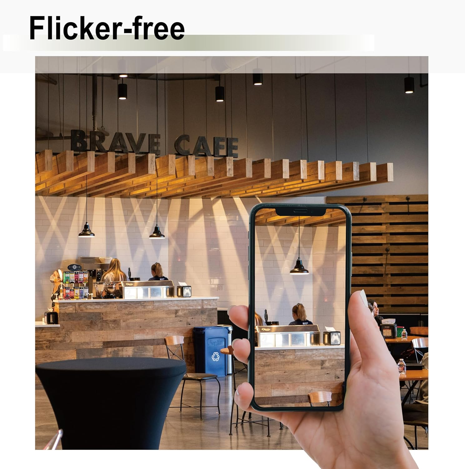 Hand hält Handy mit Café-Theke und Personal. Text 'Flicker-free'.