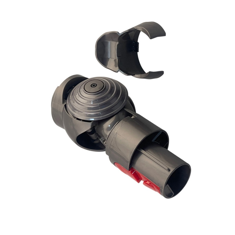 Grauer Dyson-Gelenkkopf mit rotem Verriegelungsmechanismus und separatem Halteclip.