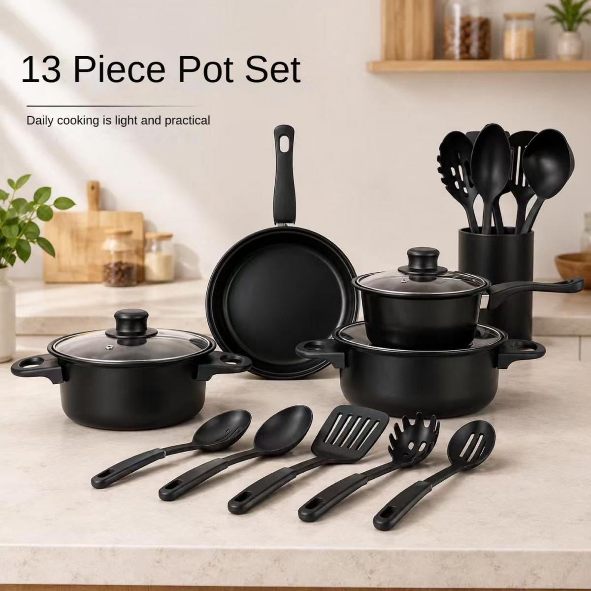 Ein 13-teiliges Kochgeschirr-Set aus schwarzem Metall mit Utensilien.
