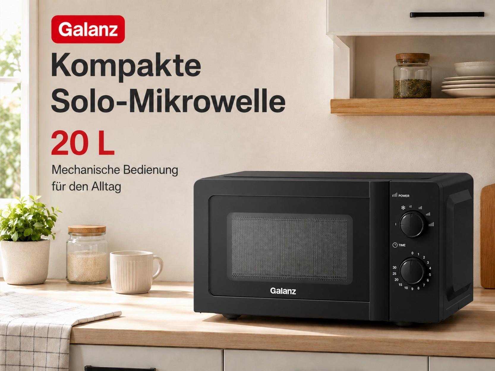 Schwarze Galanz Mikrowelle mit Drehknöpfen auf einer Holzarbeitsplatte.